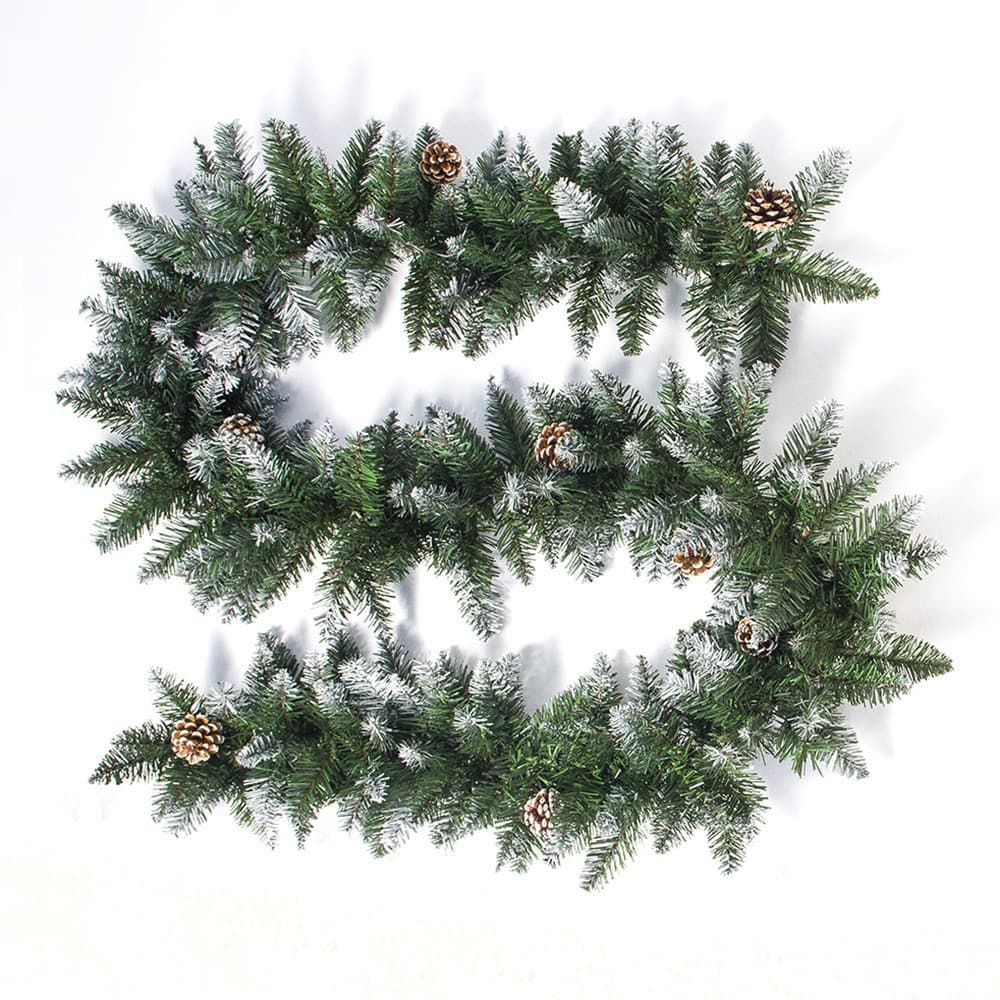 pointed tips white-sprayed with pine cones